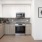 Well-lit kitchen with ample counter space