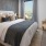 Bedroom with natural lighting and high ceilings