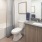 Spacious bathroom with ample lighting
