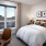 Bedroom with natural lighting and high ceilings