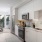 Well-lit kitchen with ample counter space