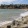 people playing and walking on a beach